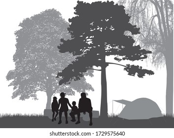 Family silhouette on vacation - camping.