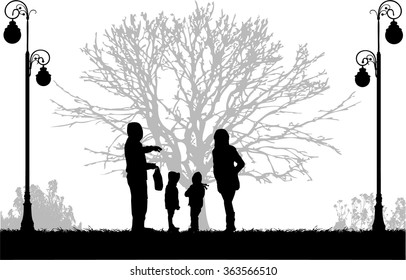 Family silhouettes in nature.