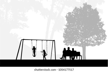 Family of silhouettes in the park.