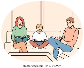 Family is sitting on couch ignoring each other for concept of communication problems. Mom and dad with their son are passionate about different things and need communication for family happiness