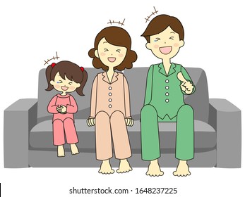 Family sitting with simple gray sofa