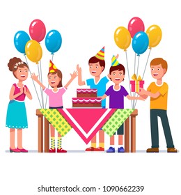 Family with three kids group celebrating holiday together. Father, mother & kids celebrate birthday party with birthday cake on table, balloons, cone caps, gift box. Flat vector character illustration