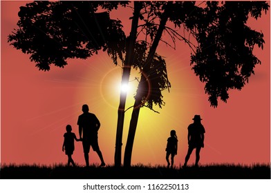 Family walk at sunset