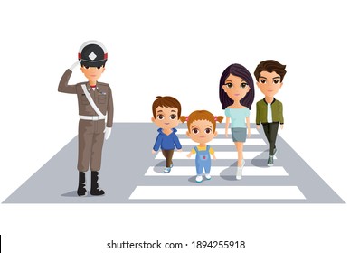 The family was walking across a city traffic crosswalk at rush hour.