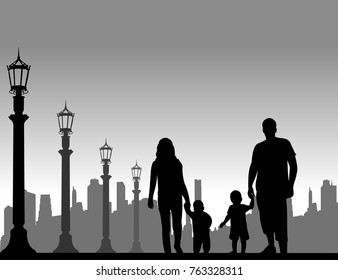 Family walking with their children on the street