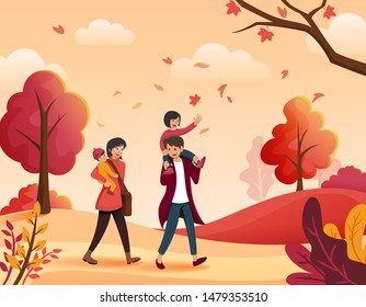 Family walking together enjoying autumn