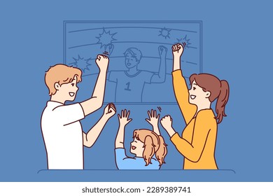 Family watches football ball on TV and celebrates victory after seeing goal scored by players of favorite sports team. Family of mom and dad with daughter watching football derby enjoying match 