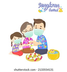 Family wear facemask in Songkran Festival.