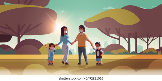 family wearing face masks toxic gas air pollution industry smog polluted environment concept parents and children walking outdoor dirty smoke landscape background full length horizontal