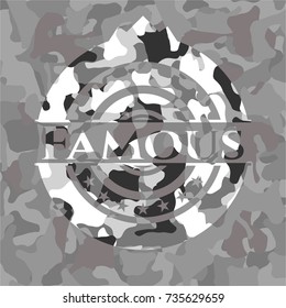 Famous written on a grey camouflage texture