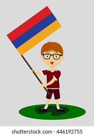 Fan of  Armenia national football team, sports. Boy with flag in the colors of the national command with sports paraphernalia.