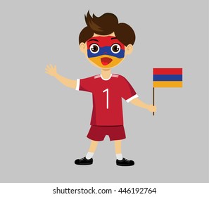 Fan of  Armenia national football team, sports. Boy with flag in the colors of the national command with sports paraphernalia.