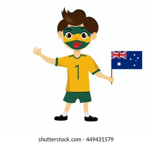 Fan of Australia national football team, sports. Boy with flag in the colors of the national command with sports paraphernalia.