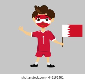 Fan of  Bahrain national football team, sports. Boy with flag in the colors of the national command with sports paraphernalia.