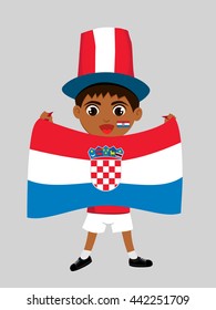 Fan of  Croatia national football team, sports. Boy with flag in the colors of the national command with sports paraphernalia.