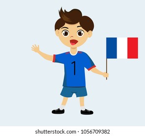 Fan of France national football, hockey, basketball team, sports. Boy with France flag in the colors of the national command with sports paraphernalia. Boy with France flag in the form of a sport.