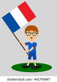 Fan of France national football team, sports. Boy with flag in the colors of the national command with sports paraphernalia. 