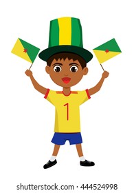 Fan of French Guiana (Guyane) national football team, sports. Boy with flag in the colors of the national command with sports paraphernalia.