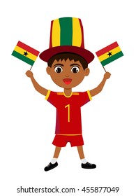 Fan of Ghana national football team, sports. Boy with flag in the colors of the state command with sports paraphernalia.