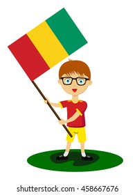 Fan of Guinea national football team, sports. Boy with flag in the colors of the state command with sports paraphernalia.