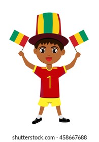 Fan of Guinea national football team, sports. Boy with flag in the colors of the state command with sports paraphernalia.