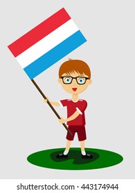 Fan of  Iceland national football team, sports. Boy with flag in the colors of the national command with sports paraphernalia.