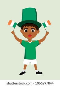 Fan of Ireland national football, hockey, basketball team, sports. Boy with Ireland flag in the colors of the national command with sports paraphernalia. Boy with Ireland flag in the form of a sport.