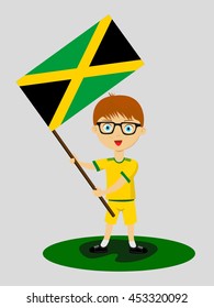 Fan of Jamaica national football team, sports. Boy with flag in the colors of the national command with sports paraphernalia.