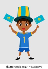 Fan of Kazakhstan national football team, sports. Boy with flag in the colors of the national command with sports paraphernalia.