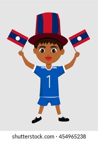 Fan of Laos national football team, sports. Boy with flag in the colors of the state command with sports paraphernalia.