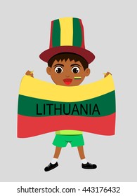Fan of  Lithuania national football team, sports. Boy with flag in the colors of the national command with sports paraphernalia.
