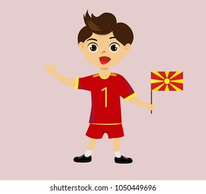 Fan of Macedonia national football, hockey, basketball team, sports. Boy with Macedonia flag in the colors of the national command with sports paraphernalia. Boy with Macedonia flag in the form