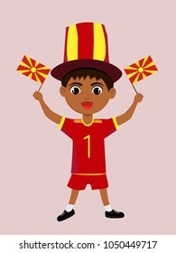 Fan of Macedonia national football, hockey, basketball team, sports. Boy with Macedonia flag in the colors of the national command with sports paraphernalia. Boy with Macedonia flag in the form