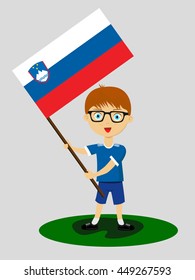 Fan of Slovenia national football team, sports. Boy with flag in the colors of the national command with sports paraphernalia.