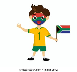 Fan of South Africa national football team, sports. Boy with flag in the colors of the state command with sports paraphernalia.