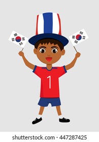 Fan of South Korea national football team, sports. Boy with flag in the colors of the national command with sports paraphernalia.