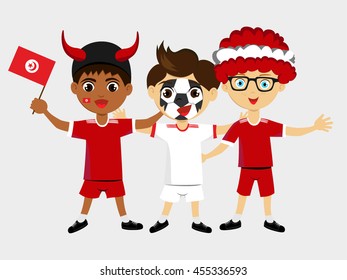 Fan of Tunisia national football team, sports. Boy with flag in the colors of the state command with sports paraphernalia.