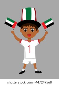 Fan of United Arab Emirates national football team, sports. Boy with flag in the colors of the national command with sports paraphernalia.