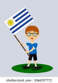 Fan of Uruguay national football, hockey, basketball team, sports. Boy with Uruguay flag in the colors of the national command with sports paraphernalia. Boy with Uruguay flag in the form of a sport.