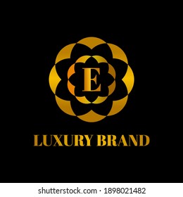 Fancy logo design template, simple E initials on black background, suitable for restaurants, hotels, cafes, shops, fashion, beauty salons, etc. vector design