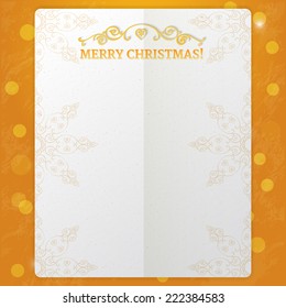 Fancy paper frame with ornate elements and text merry christmas at orange background with glowing lights and bokeh