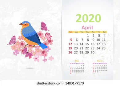 fancy pretty bird on branch of blossom tree. calendar 2020 design, april
