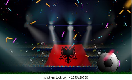 Fans hold the flag of Albania among silhouette of crowd audience in soccer stadium with confetti to celebrate football game. Concept design for football result template