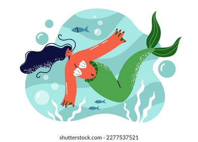 Fantastic mermaid from myths and fairy tales swims underwater among fish and algae growing on seabed. Mythical mermaid with green fishtail peacefully travels on sea or ocean floor 