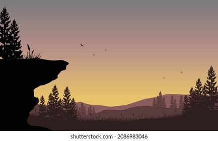 Fantastic mountains panorama from the out of the city at dusk with the aesthetic silhouette of the surrounding pine trees. Vector illustration of a city