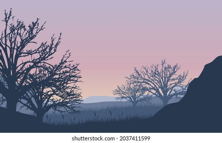 A fantastic silhouette of the mountain view with dry trees from the countryside at sunrise in the morning. Vector illustration of a city
