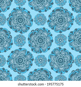 Fantasy floral pattern. Blue flowers on a light blue background. Hand drawing, hippie pattern. Vector.