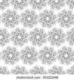 Fantasy flowers mandala pattern. Seamless pattern.