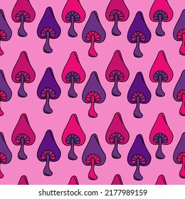 Fantasy mushrooms seamless pattern, bright hat mushrooms on a pink background vector illustration