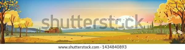 Fantasy panorama landscapes of Countryside in\
autumn,Panoramic of mid autumn with farm field, mountains, wild\
grass and leaves falling from trees in yellow foliage. Wonderland\
landscape in fall\
season